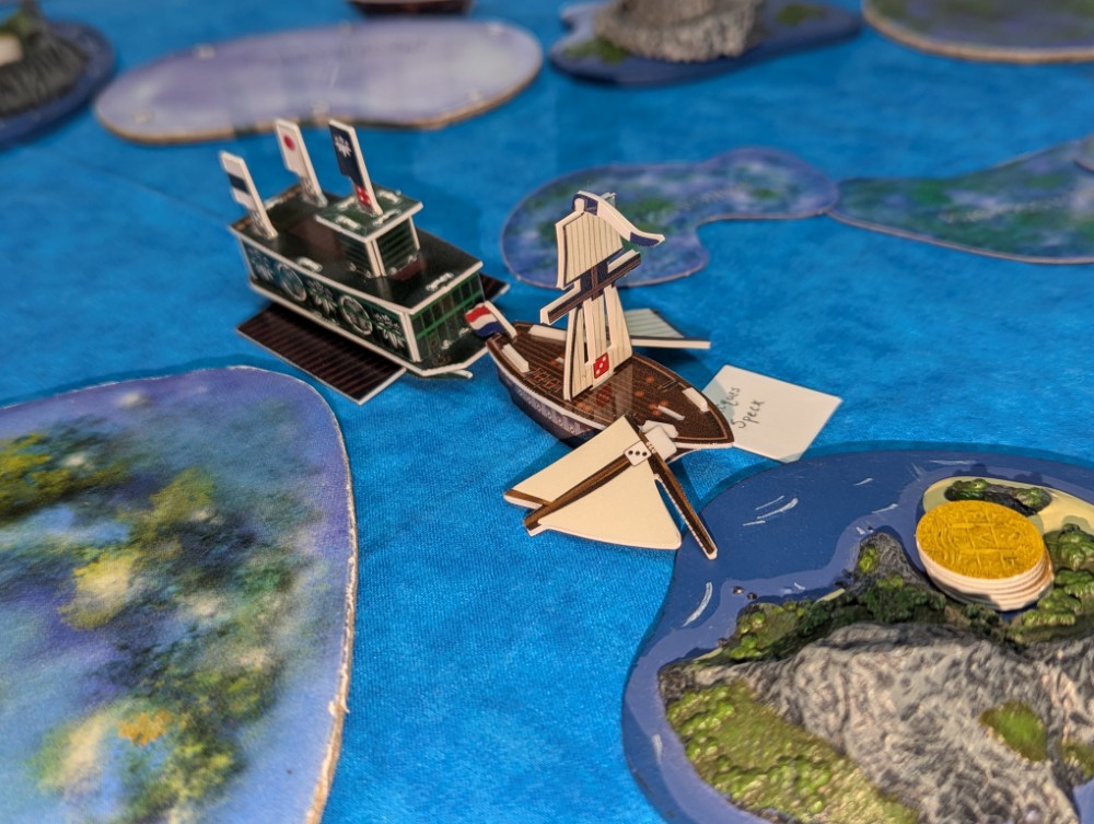Ohama Kagetaka draws first blood with his Kitabatake atakebune! The pirates he's recruited (Robert Sample and Robert Lane) into the Japanese fleet help him damage the Friesland. Jacques Specx is killed, but there are still two merchants in play.